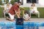 Father Putting Product in the Pool with Son and 2 Women 父子将产品放入水中