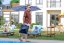Father Lifting Product by the Pool 男人在岸边拎着产品