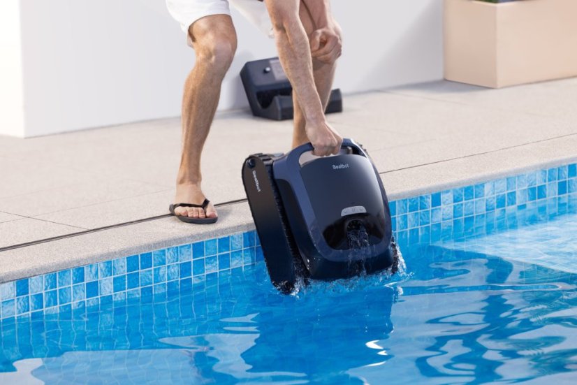 Man Putting Product into the Pool 男人将产品放入水中